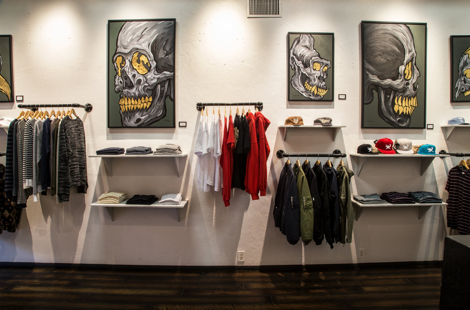 Photo of Clothing racks filled with product