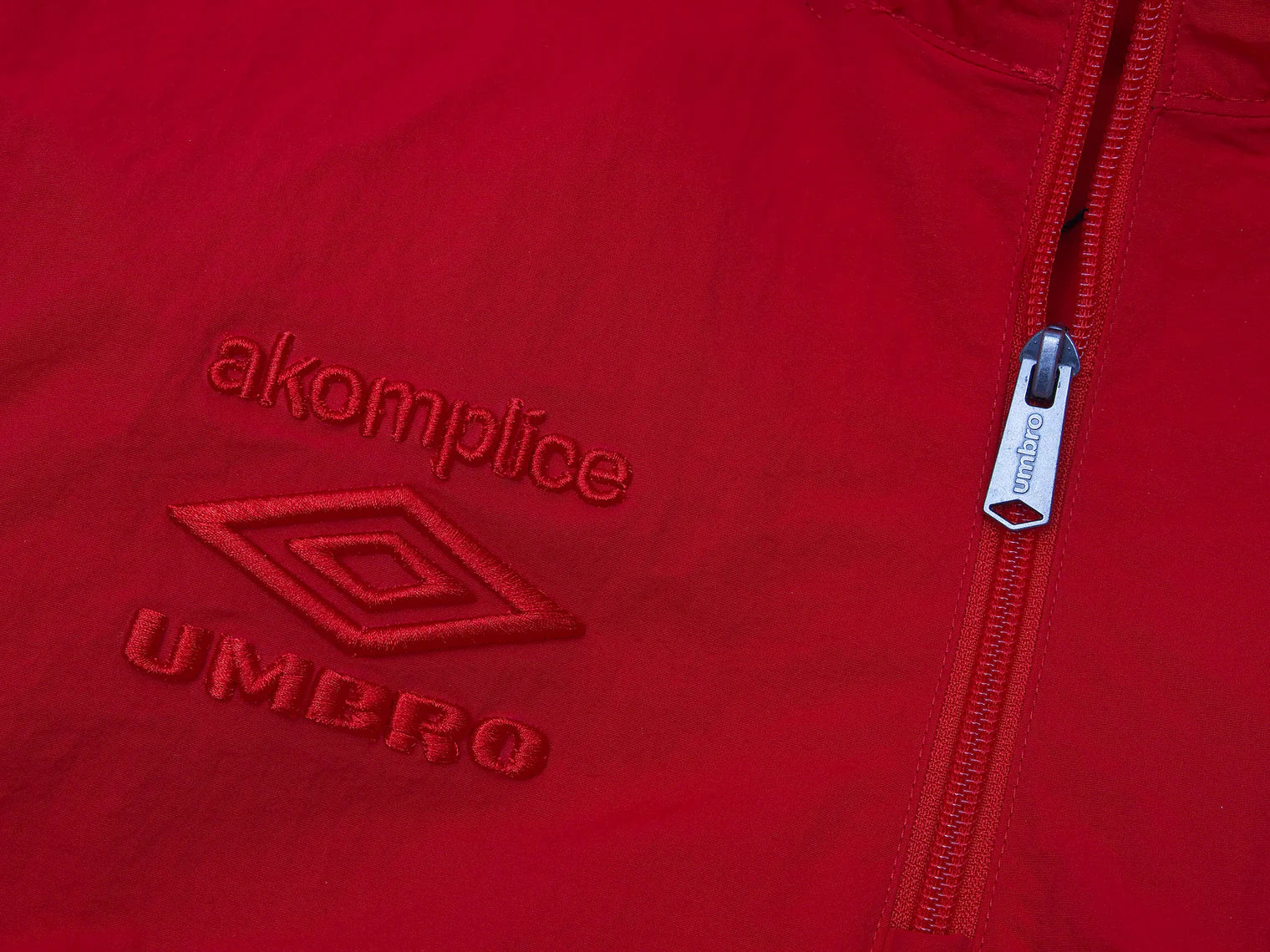 Akomplice x Umbro World Peace Nylon 1/4 Zip (Lychee Red)