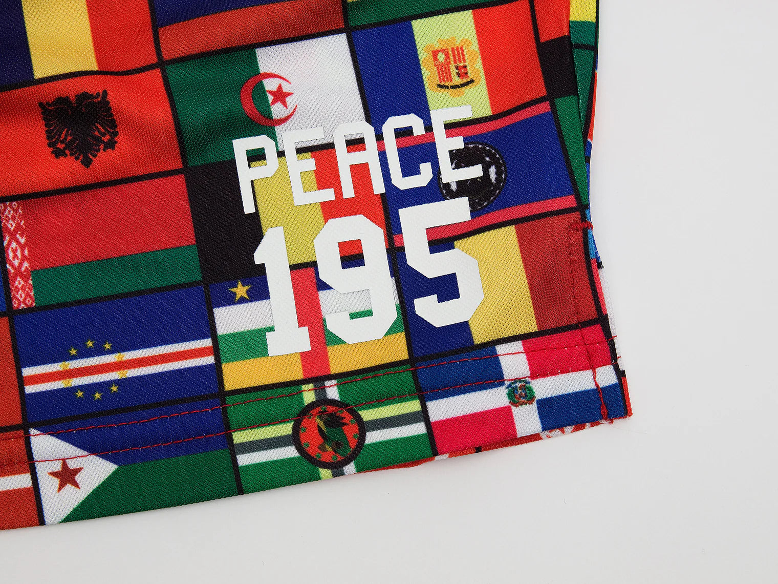 Akomplice x Umbro World Peace Nylon Shorts (Multicolor)