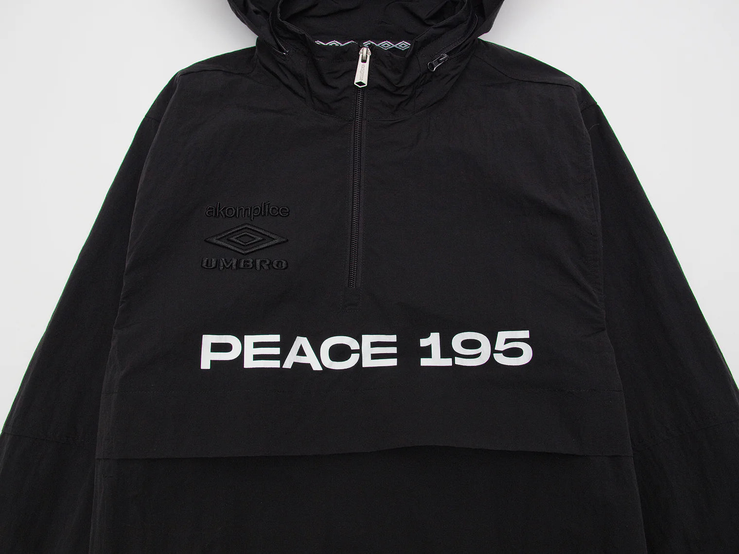 Akomplice x Umbro World Peace Nylon 1/4 Zip (Black)