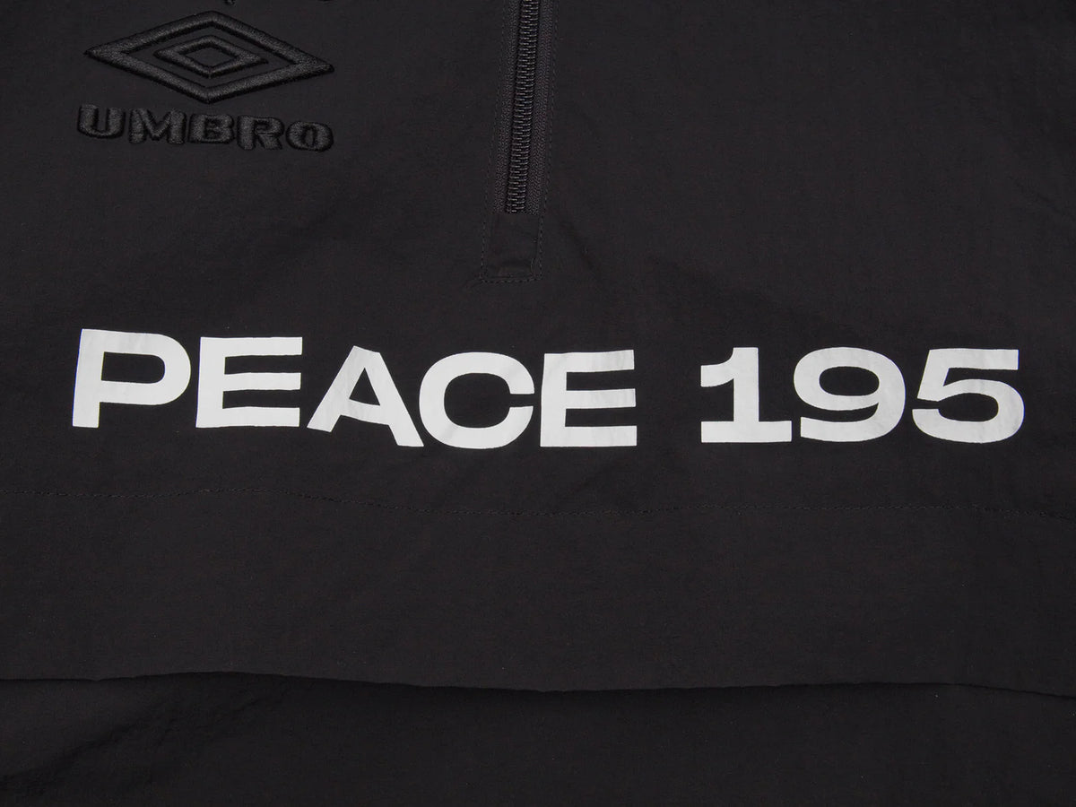 Akomplice x Umbro World Peace Nylon 1/4 Zip (Black)