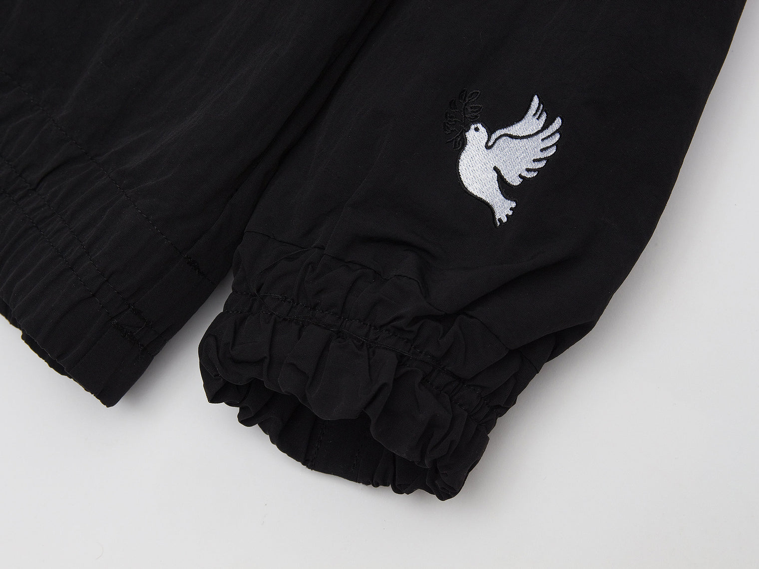 Akomplice x Umbro World Peace Nylon 1/4 Zip (Black)