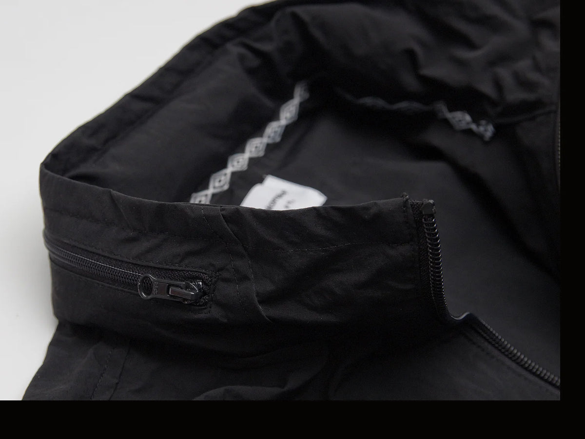 Akomplice x Umbro World Peace Nylon 1/4 Zip (Black)